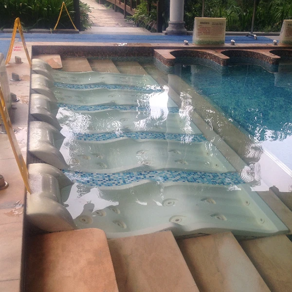 An outdoor hydrotherapy pool with four laying positions