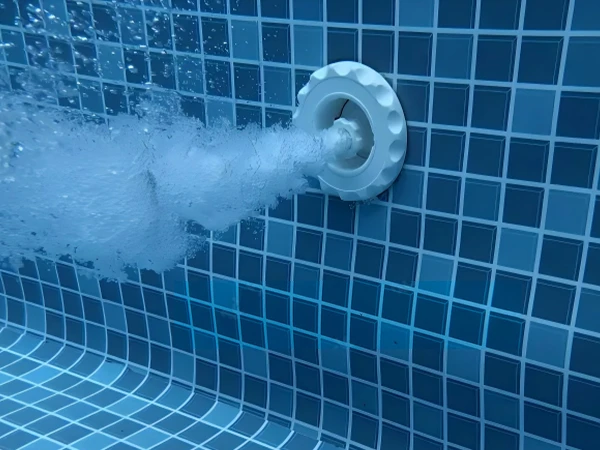 Pool hydro jet is jetting water flow in the pool