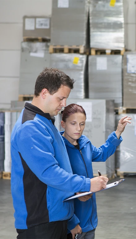 Workers are checking the goods