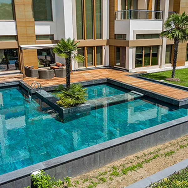 Irregular ornamental pool outside the house