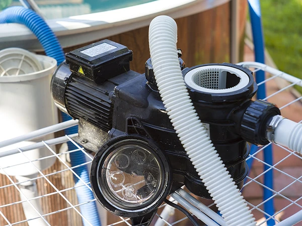 Water circulating pump with the lid open in the pool water treatment system