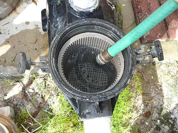 Water is being injected into the inside of the swimming pool pump.